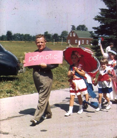 Edwin Lenfestey leading the parade in 1948 - Hubbard looking southwest to Farmington Rd - barn part of St. Mike's complex.jpg